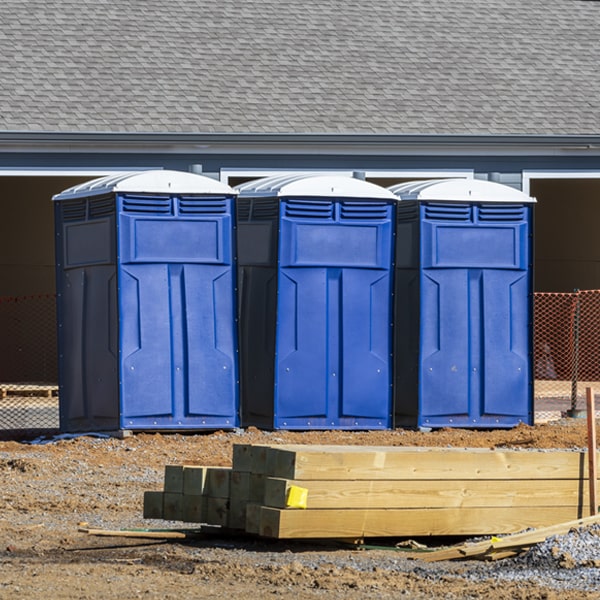 what is the cost difference between standard and deluxe porta potty rentals in Del Sol